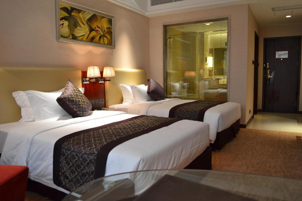 Wuhan Tianchimel Hotel Oda fotoğraf
